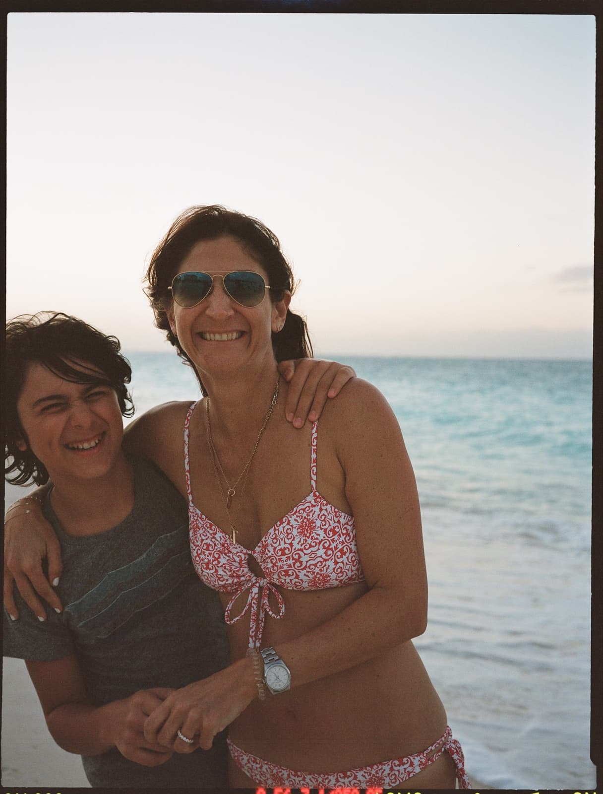 Mom and Mack on the beach (film scan).