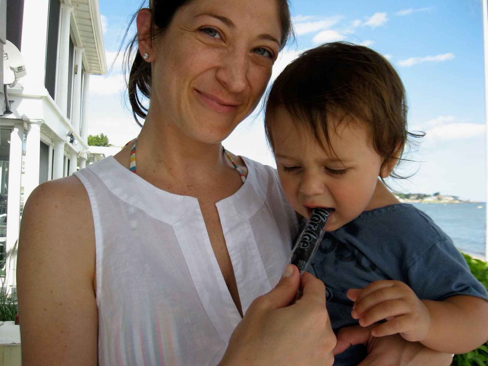 Mom and Mack on the beach, twizzler in hand - one of those moments that turned into a memory.